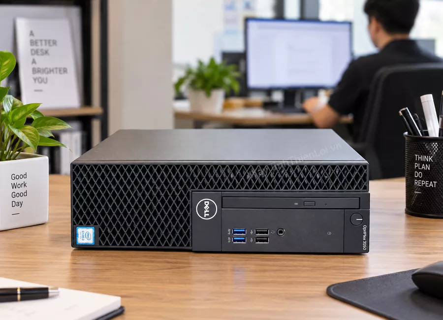 Máy tính Dell OptiPlex 3050 SFF đặt nằm ngang gọn gàng trên bàn làm việc văn phòng.