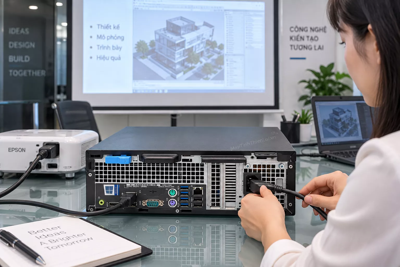 Cận cảnh thao tác cắm cáp vào các cổng kết nối đa dạng ở mặt sau máy tính Dell OptiPlex 5050 SFF